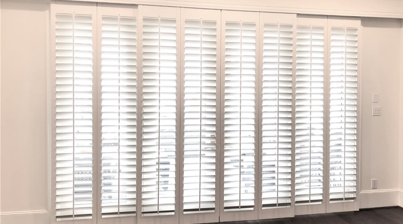 Sliding door with plantation shutters